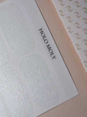 Holo Moly Nailpolish Wraps – silbernes Glitzerdesign mit holografischem Effekt in Verpackung von Die Nageltante